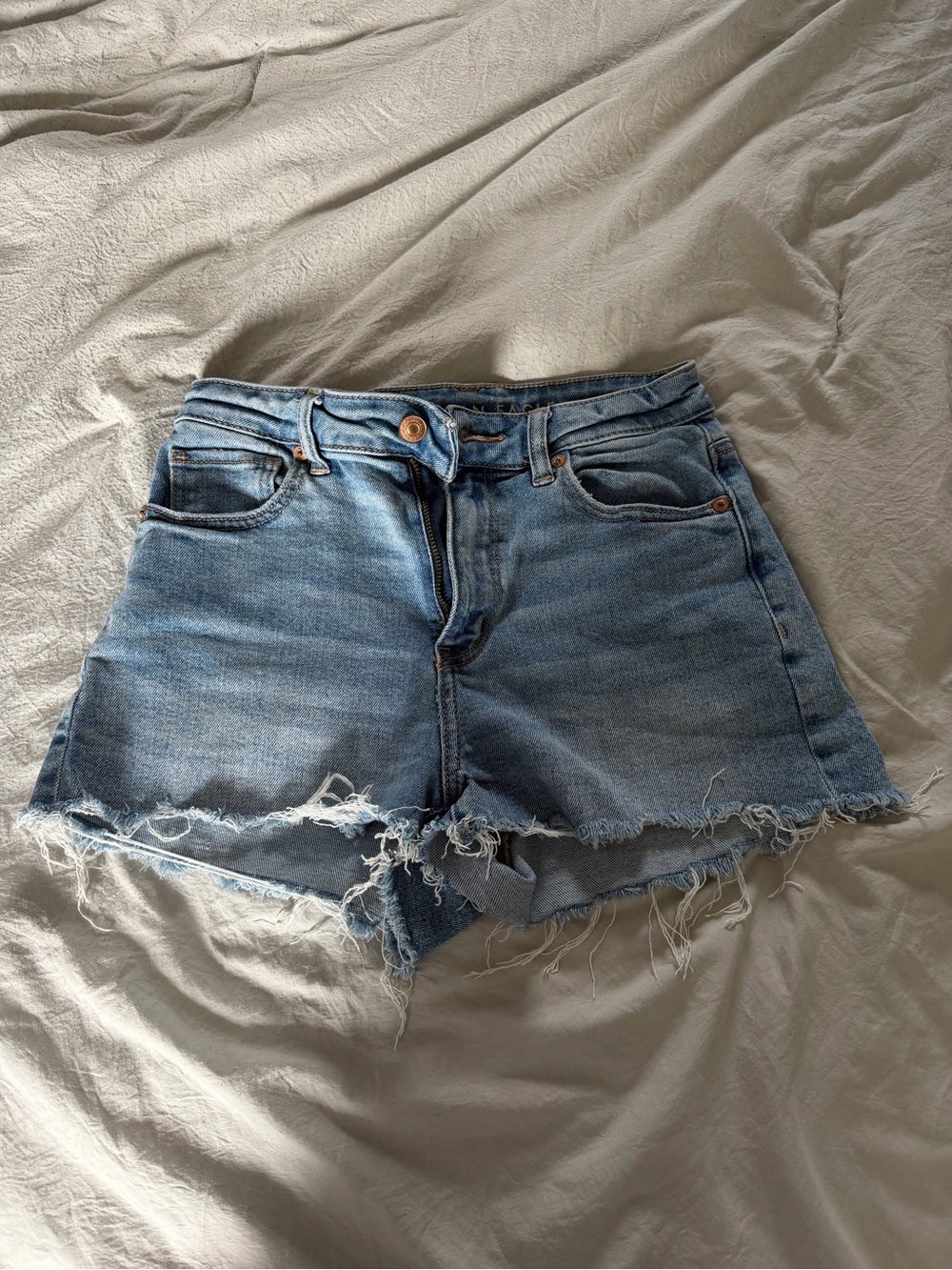 American Eagle High Wasted Light Blue Frayed Hem Denim Shorts